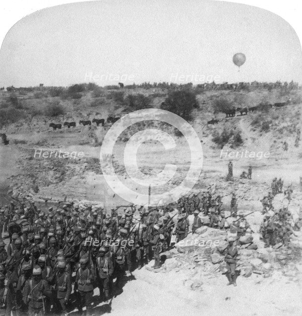 Lord Roberts' infantry crossing the Zand River, South Africa, 1900. Artist: Underwood & Underwood