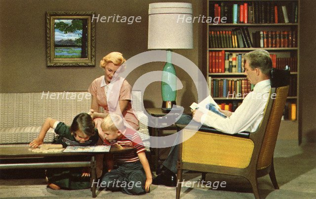 Family sitting in their living room, USA, 1962. Artist: Unknown