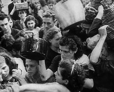 Italian Civilians Gathering Water in Naples, 1943-1944. Creator: British Pathe Ltd.