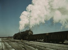 Locomotive in a railroad yard, Chicago and Northwestern RR (?), near Chicago, Ill.(?), 1942 or 1943. Creator: Jack Delano.