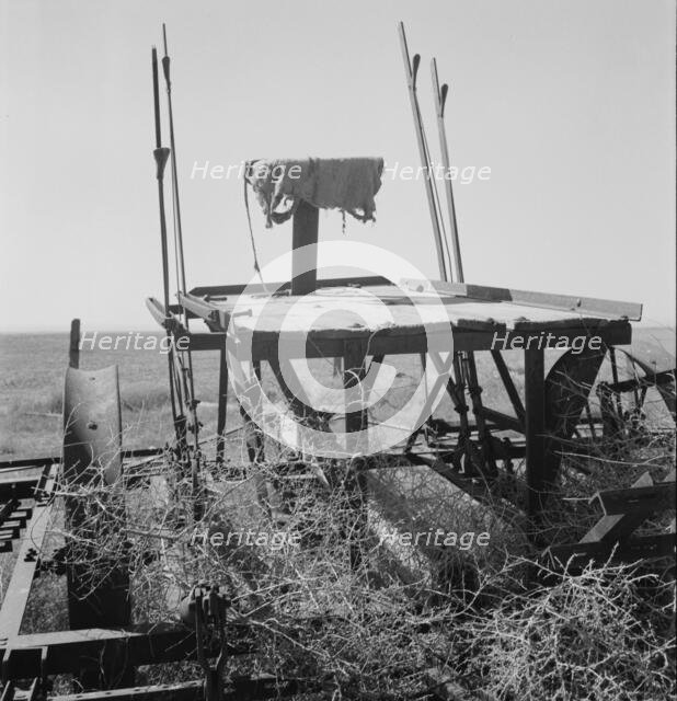 Possibly: Farm machinery left on abandoned dry land farm in Columbian Basin, Washington, 1939. Creator: Dorothea Lange.