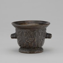 Mortar with Foliate Grotesques, Goats' Heads, and Ribbed Handles, mid 16th century. Creator: Unknown.