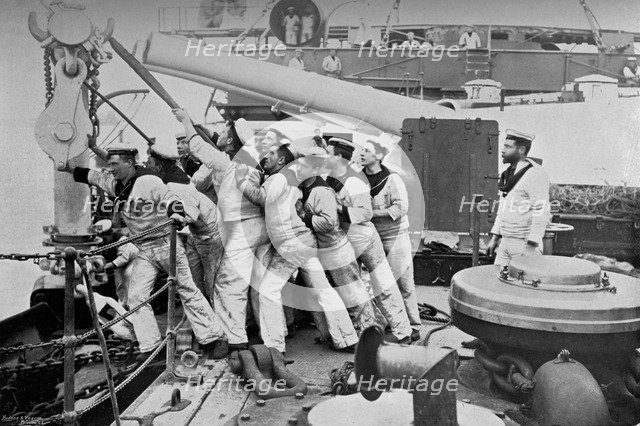 Raising the anchor on the forecastle of the battleship HMS 'Majestic', 1896Artist: Gregory & Co