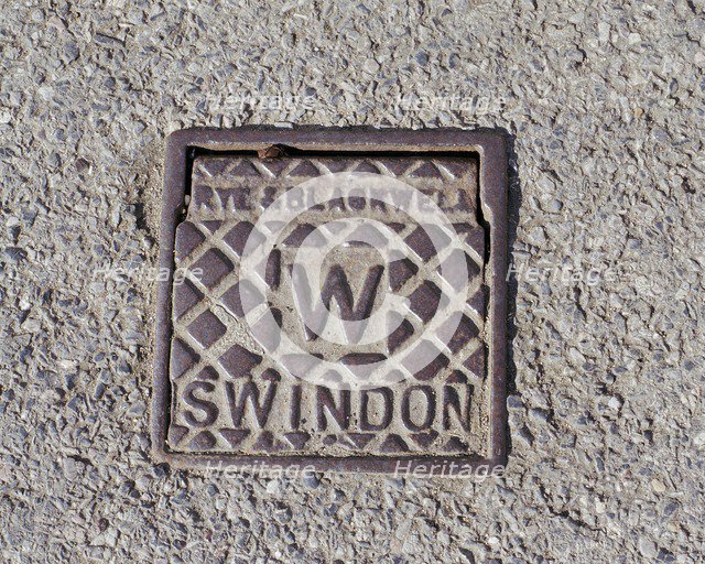 A water stop tap cover plate made by Rye and Blackwell, Swindon, Wiltshire, 2006. Artist: Peter Williams.
