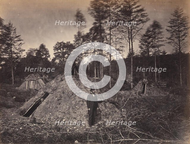 Woodchoppers' Huts in a Virginia Forest. On the Orange & Alexandria Railroad. Wood Su..., June 1863. Creator: Andrew Joseph Russell.