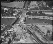 Construction of the new Hampton Court Bridge alongside the old one, Hampton Court, London, c1930s. Creator: Arthur William Hobart.