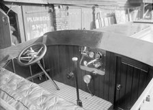The Interior of a Wolseley launch showing controls and instrument panel. Creator: Kirk & Sons of Cowes.