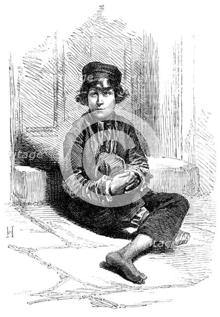 A "City Arab" - from a photograph taken before admission to the Belvedere-Crescent Reformatory, 1856 Creator: Unknown.