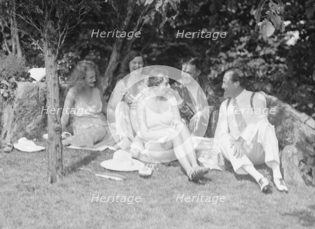 Langeloth group on Langeloth estate, Riverside, Connecticut, seated outdoors, 1932 June 7. Creator: Arnold Genthe.
