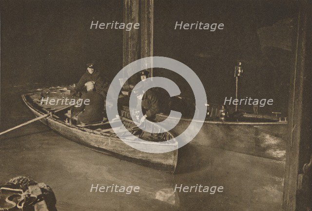 'Thames Police on the Night Patrol Which Guards The Safety of the River', c1935. Creator: Unknown.