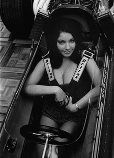 Female model in cockpit of Cooper F5000 at 1969 Racing Car show. Creator: Unknown.