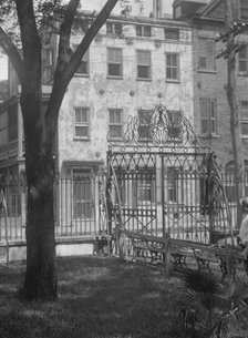Park and houses, [36 Chalmers Street through Washington Park Gate], Charleston..., c1920-c1926. Creator: Arnold Genthe.
