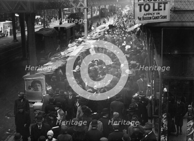 Crowded street, possibly near a subway station, between c1910 and c1915. Creator: Bain News Service.