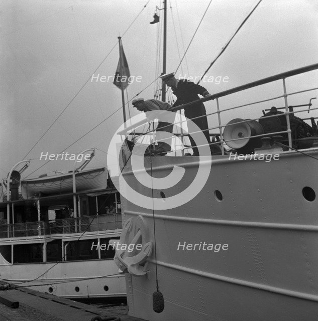 Ship by a quay, Stockholm harbour, Sweden, 1960. Artist: Torkel Lindeberg