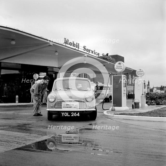 Mini on the 1959 Mobil Economy Run, re- fuelling. Creator: Unknown.