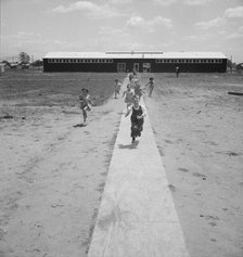 Nursery school children showing community...Farmersville FSA camp, Tulare County, CA, 1939 Creator: Dorothea Lange.