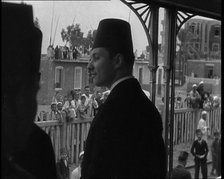 Farouk I, His Majesty The King of Egypt Waving to Crowds, 1936. Creator: British Pathe Ltd.