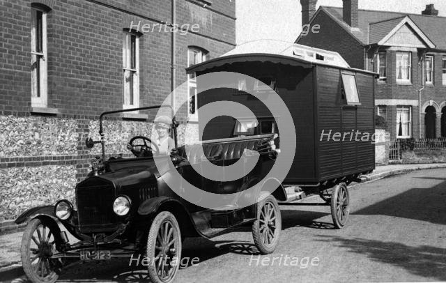 1921 Ford Model T with caravan. Creator: Unknown.