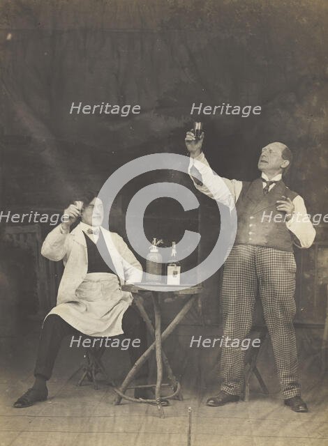 Two sailors pose on stage, holding up a drink, (between 1910 and 1919?). Creator: Unknown.