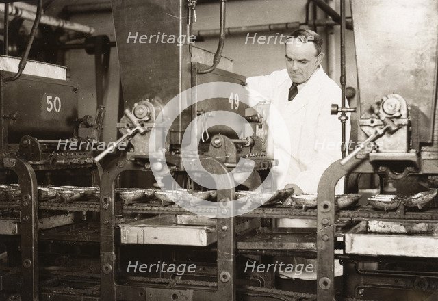 Easter egg moulding machine, Rowntree factory, York, Yorkshire, 1930. Artist: Unknown