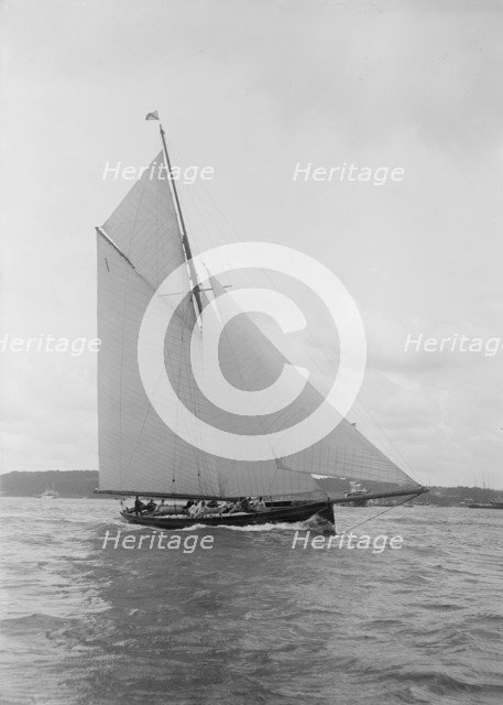 The gaff rigged cutter 'Bloodhound' sailing close-hauled, August 1912. Creator: Kirk & Sons of Cowes.