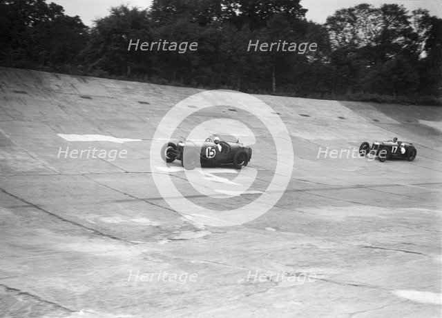 Two Riley 9 Brooklands racing on the banking at a JCC Members Day, Brooklands. Artist: Bill Brunell.