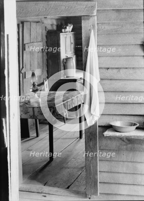 Washstand in the dog run and kitchen of Floyd Burroughs' cabin, Hale County, Alabama, 1936. Creator: Walker Evans.
