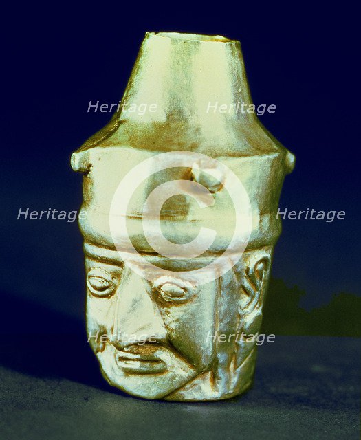 Anthropomorphic head shaped vase, made of silver and representing a hook-nosed person.