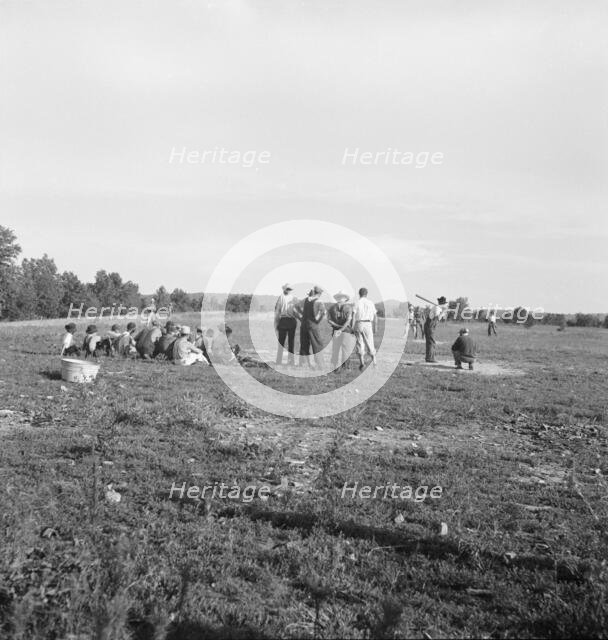 Farmers' baseball game in the country, on U.S. 62, near Mountain Home, northern Arkansas, 1938. Creator: Dorothea Lange.