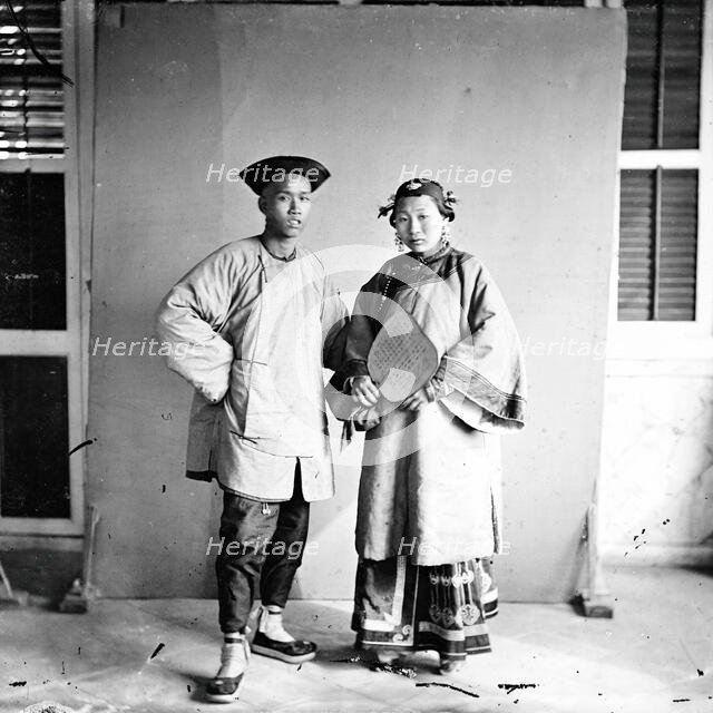 Amoy, Fukien province, China: a married couple, standing, 1870. Creator: John Thomson.