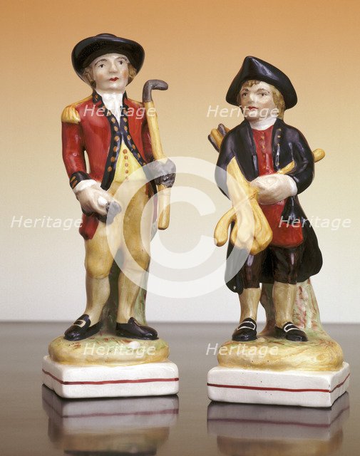 'The Blackheath Golfer' and his caddy Staffordshire figures, c1930. Artist: Unknown