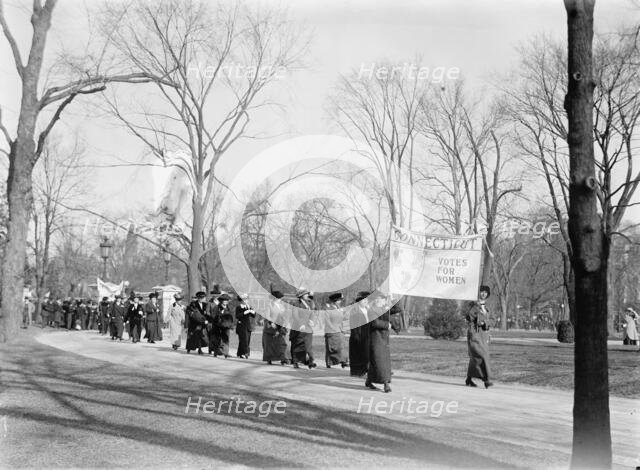 Woman Suffrage - at White House with Banners, 1914. Creator: Harris & Ewing.
