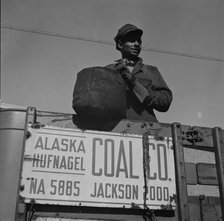 Negro coal hauler for the Alaska Hufnagel Coal Company, Washington, D.C., 1942. Creator: Gordon Parks.