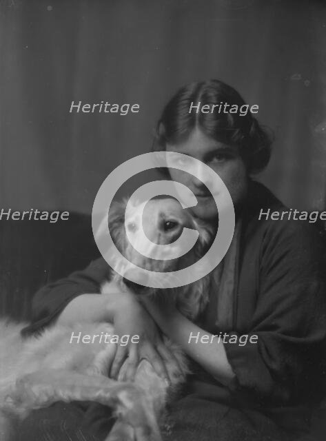 Wessell, Miss (Mrs. A.L. Cochrane), or Mrs. Meyer D. Rothchild, with dog, portrait..., 1916 or 1917. Creator: Arnold Genthe.