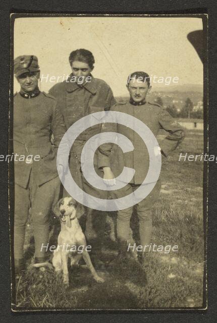 Men and dog, 1915-1930. Creator: Fédèle Azari.
