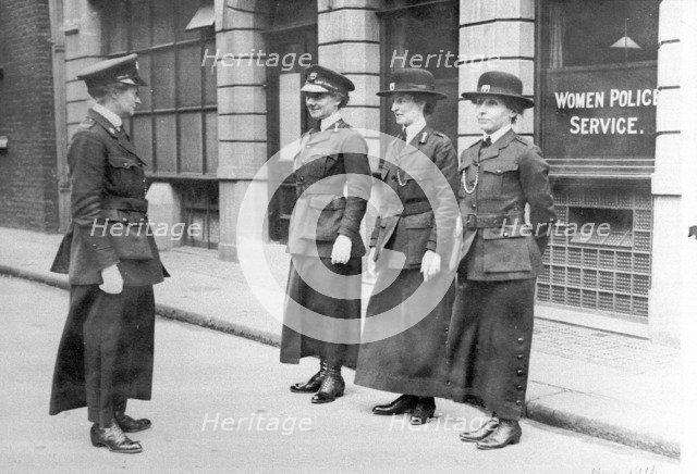 Policewomen being inspected by Mary S Allen in London, May 1915. Artist: Unknown