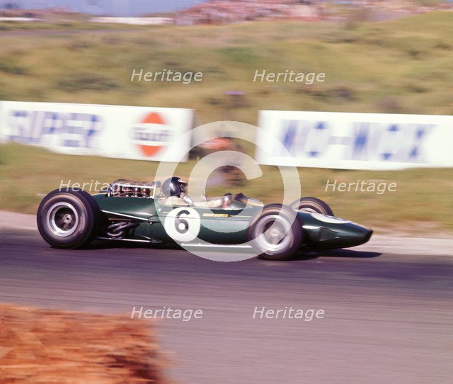 James Clark driving a 1966 Lotus 33 Climax V8. Artist: Unknown.