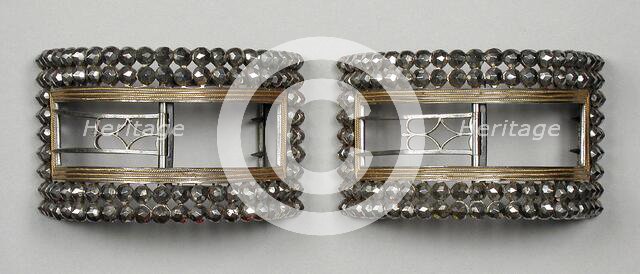 Pair of man’s steel and gilt wire shoe buckles, England, c.1777 and c.1785. Creator: Unknown.