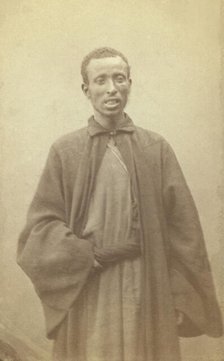 Three quarter portrait of African man, facing front, between 1870 and 1886. Creator: Unknown.