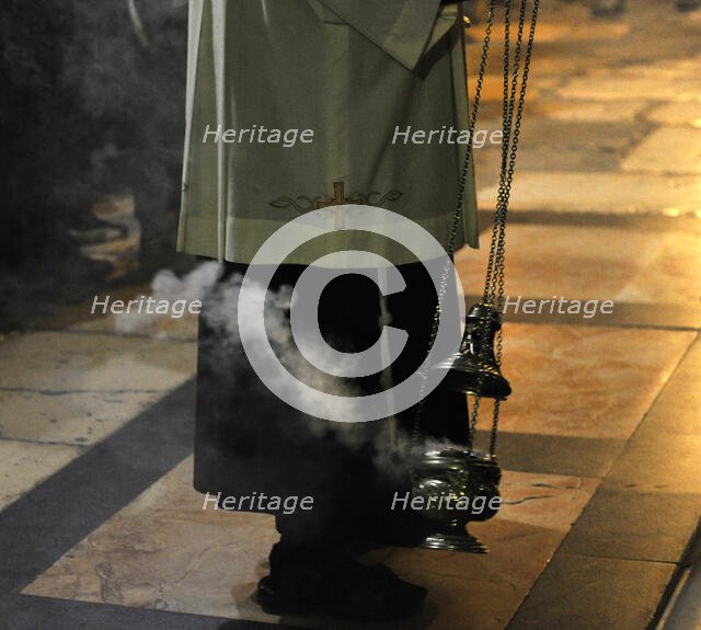 Priest uses incense, Jerusalem, Israel, 2014.  Creator: LTL.