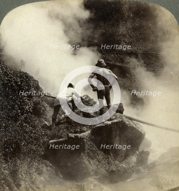 Watching an eruption of steam and boiling mud halfway up the volcano of Aso-san, Japan, 1904. Artist: Underwood & Underwood