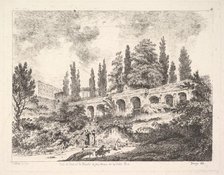View of the entrance to Tivoli and the walls of the Villa d'Este, horsemen approac..., 18th century. Creator: Jean Claude Richard Saint-Non.