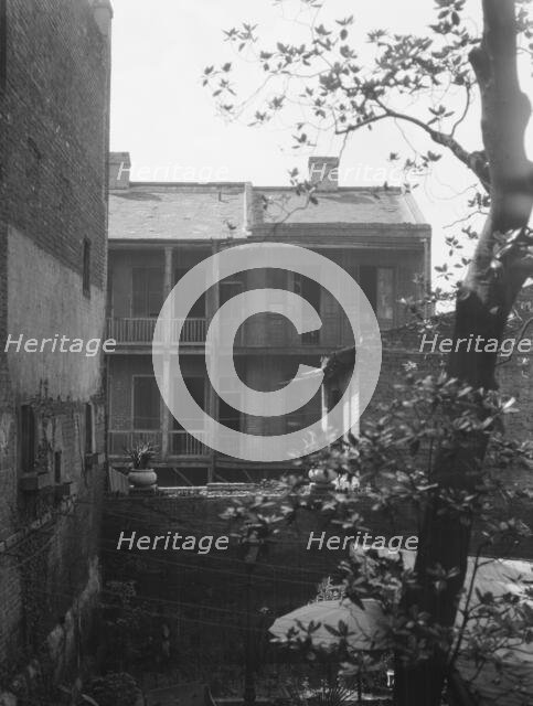 Courtyard, New Orleans, between 1920 and 1926. Creator: Arnold Genthe.