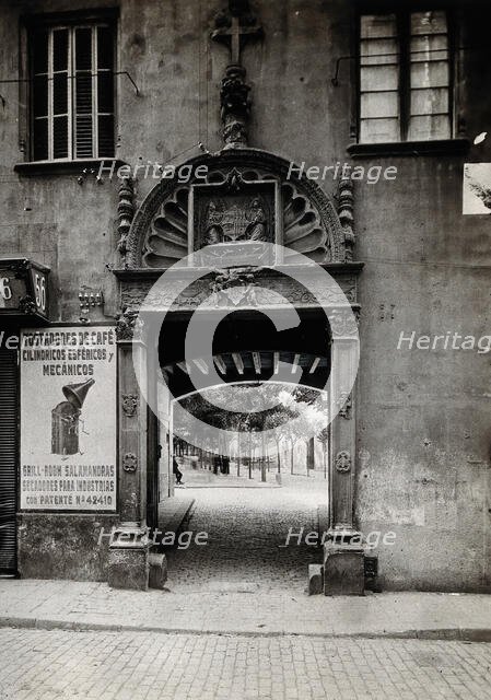 Hospital de la Santa Cruz, Barcelona: the door leading through to the courtyard, c1900. Creator: Unknown.