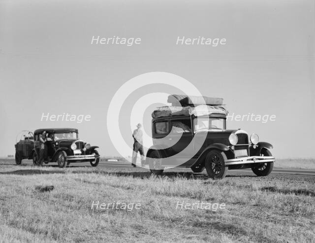 Two families originating from Independence, Kansas, US99, between Tulare and Fresno, 1939. Creator: Dorothea Lange.
