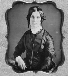 Joannette Clark Benjamin, three-quarter length portrait of a woman, facing front, seated, c1840-1860 Creator: Unknown.