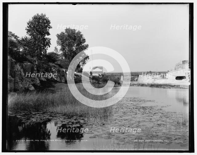 Racine, Wis., Root River rapids, old cement mills, between 1880 and 1899. Creator: Unknown.