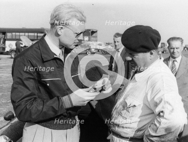Mike Hawthorn with a model car, c1953-c1958. Artist: Unknown