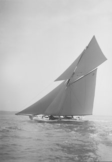 The cutter 'Rosamond' sailing close-hauled, 1911. Creator: Kirk & Sons of Cowes.