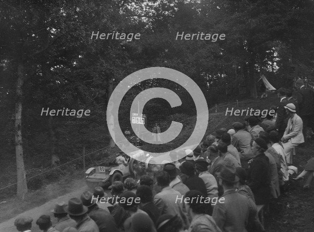 Bentley open 4-seater competing in the Shelsley Walsh Hillclimb, Worcestershire, 1935. Artist: Bill Brunell.